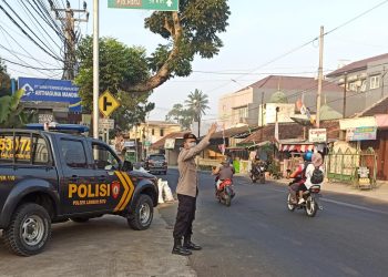 Ciptakan Lalu Lintas Lancar Dan Kamtibmas Yang Aman, Anggota Polsek Lembursitu Laksanakan Patroli Pengaturan Lalu Lintas