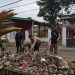 Bhabinkamtibmas Polsek Lembursitu Kerja Bakti Gotong Royong Bersama Warga Membersihkan Sampah Jalur Irigasi