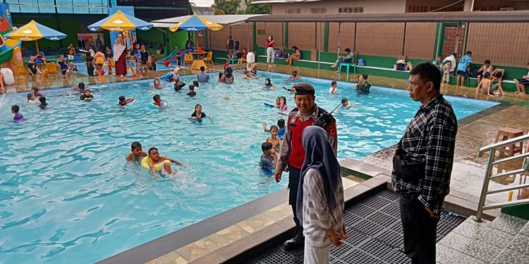 Patroli Dialogis dan Sambang Juru Parkir Petugas Patroli Berikan Himbauan Kamtibmas