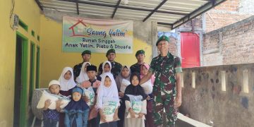 Senyum Anak Yatim Saat Menerima Santunan Daei Yonif 310/KK Di Cikembar