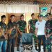Jalani Misi Kemanusiaan, Yon Armed 13/ Kostrad Berikan Empat Kursi Roda Pada Warga Desa Damarraja