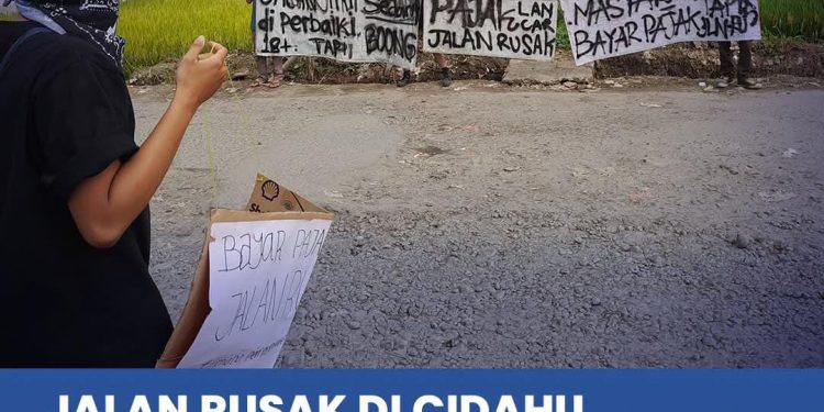 Jalan Caringin – Cidahu Rusak Parah Abadi Warga Gelar Aksi Protes, Dinas PU Pastikan Juli 2025 Diperbaiki